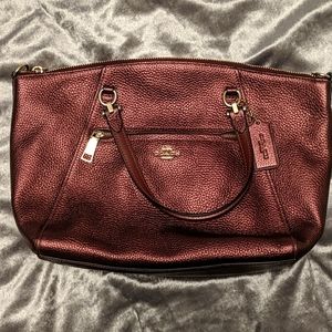 Beautiful cranberry and gold Coach bag